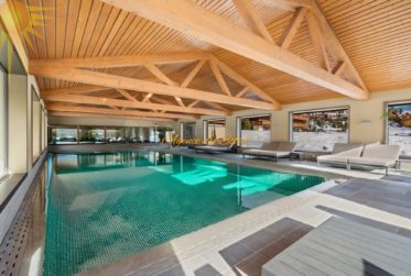 Luxueux appartement de 5.5 pièces en plein centre de la station et en bordure directe du golf !